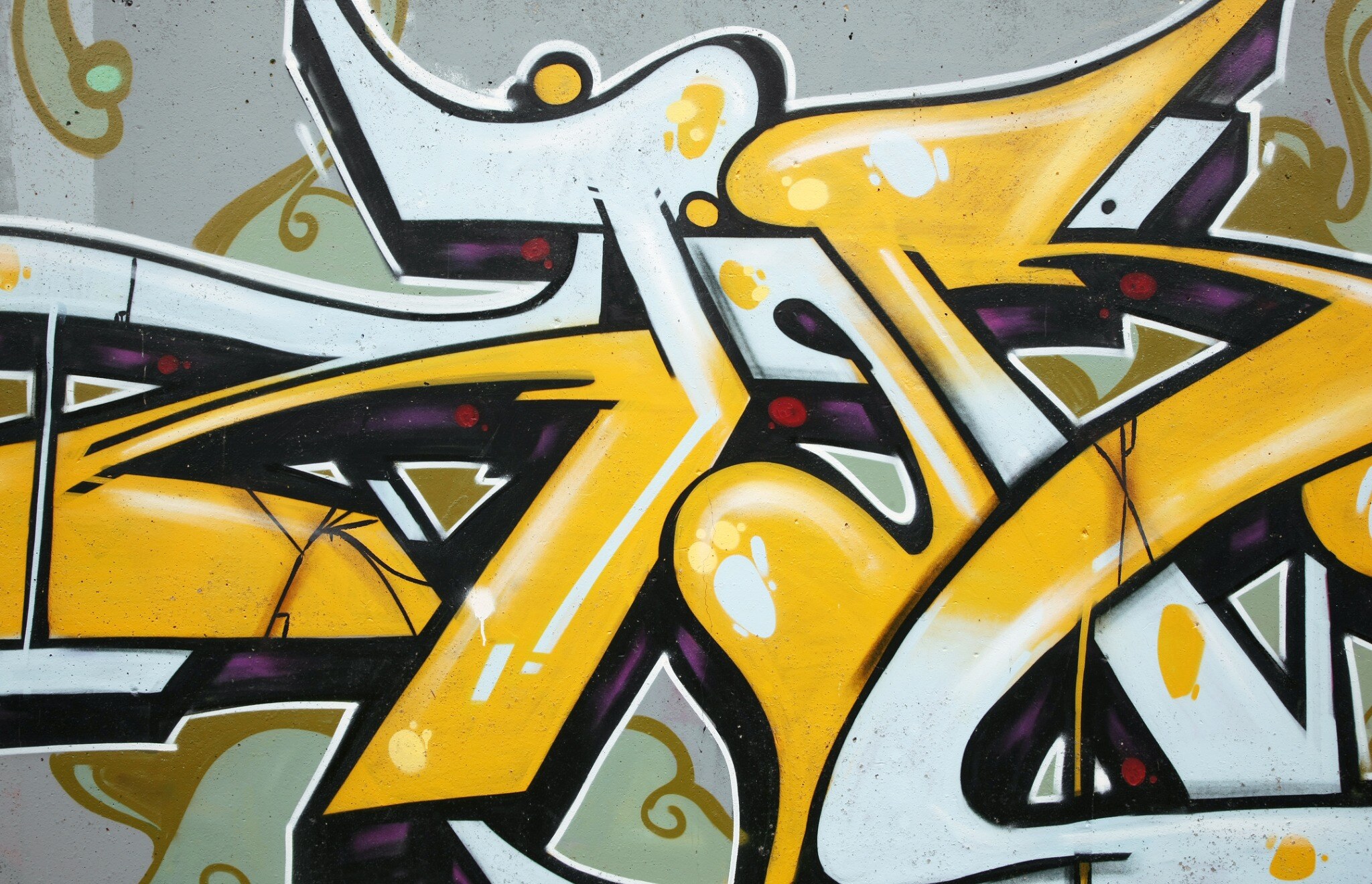 Yellow, white and black urban graffiti detail